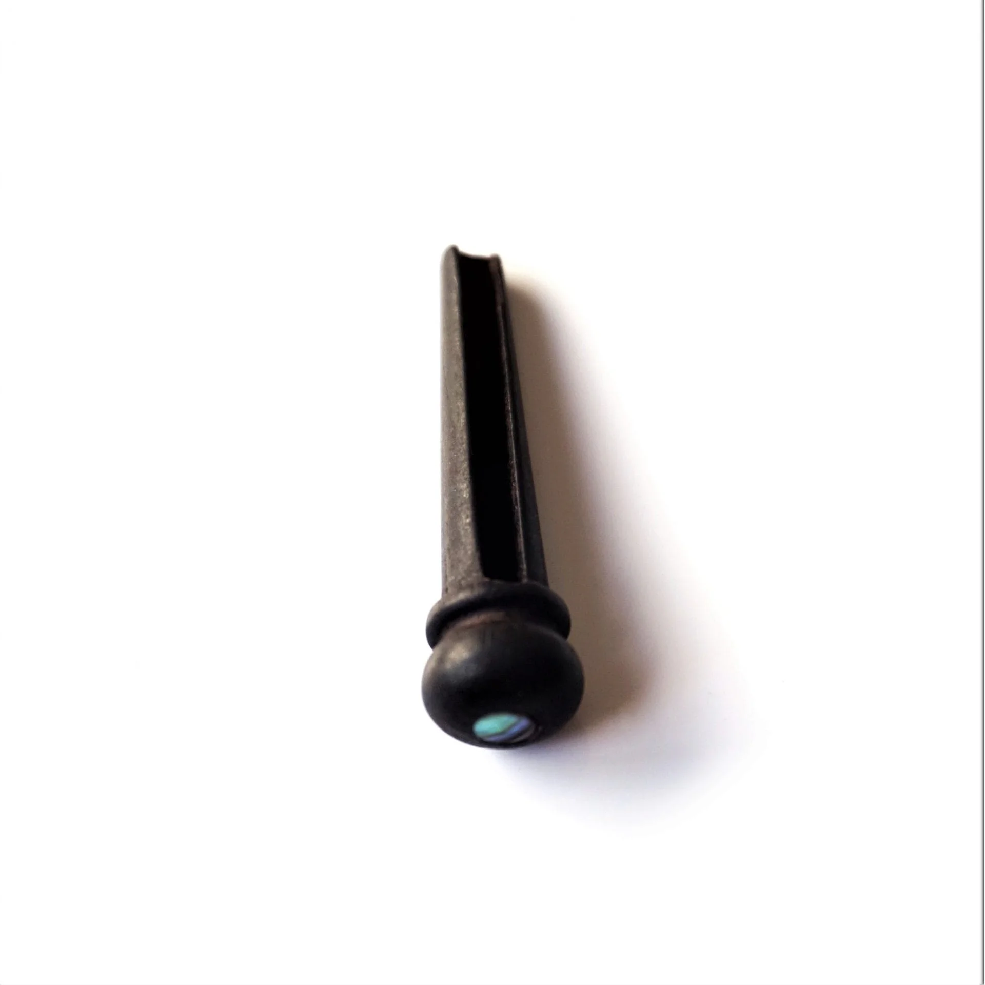 Ebony bridge pins by Guitar Anatomy