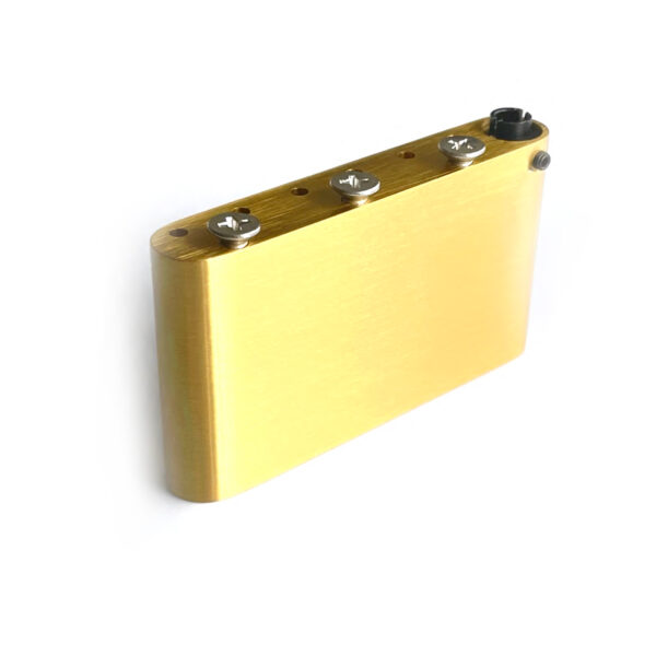 "Replacement Tremolo Block for Wilkinson M Series and select Fender Stratocaster guitars – solid brass construction, 250g weight."