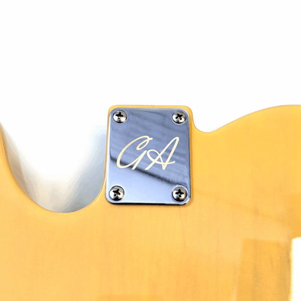GA Chrome Neck plate displayed on a body.