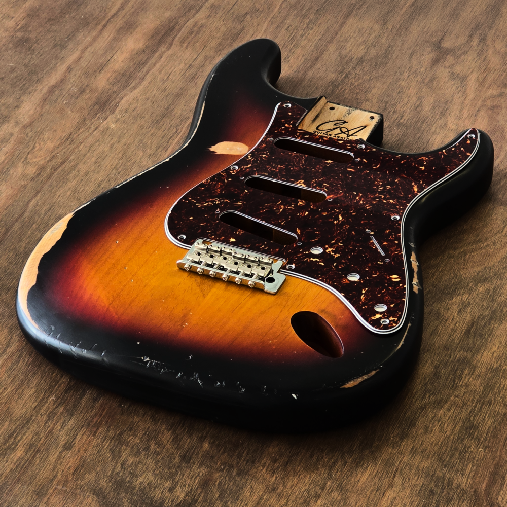 2-piece alder S-style guitar body finished in Sunburst nitro with hand-aged played-in character.