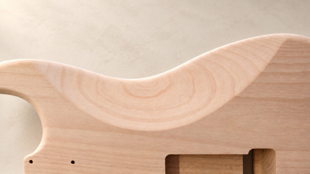 Close-up of an unfinished guitar body surface