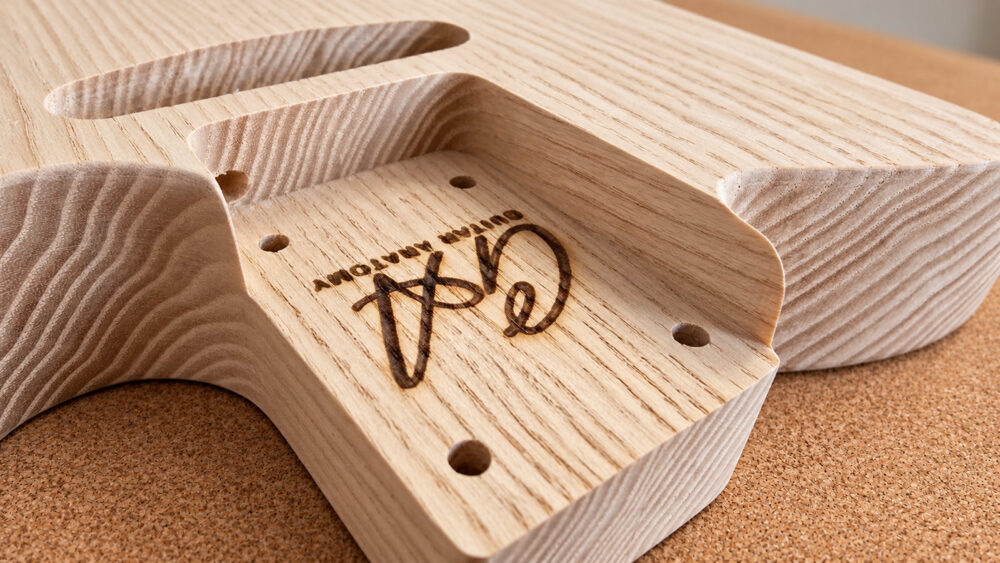 Close-up of a guitar body neck pocket
